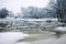 Frosty winder landscape with snow and ice in river