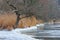 Frosty winder landscape with snow and ice in river