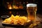 A frothy beer and crispy chips served in a cozy bar