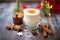 frothy eggnog in a decorated glass, sugar rim, star anise atop