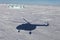 Frozen Arctic ocean and helicopter shadow