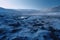 Frozen arctic tundra landscape with blue sky and snow, created using generative ai technology
