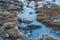 Frozen beach with stones at Ullsfjord in Troms county, Norway