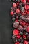 Frozen berries, border food background