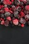 Frozen berries, border food background