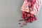 Frozen berries in the plastic bag and on table, raspberry, strawberry, cranberry and black currant, horizontal, copy space, top