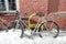 Frozen bicycle in winter