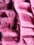 Frozen Black Elderberry flavour gelato - full frame detail. Close up of a pink surface texture of Ice cream