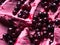 Frozen Black Elderberry flavour gelato - full frame detail. Close up of a pink surface texture of Ice cream