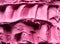 Frozen Black Elderberry flavour gelato - full frame detail. Close up of a pink surface texture of Ice cream