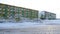 Frozen block of flats in Siberia. Tiksi .Painted blocks of Russia. Abandoned building in Tiksi