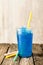 Frozen Blue Slushie in Plastic Cup with Straw