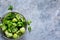 Frozen broccoli on a concrete background with space for text, healthy diet food.