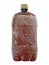 Frozen brown plastic bottle taken closeup.Isolated.