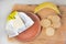 frozen butter with banana cookies and banana on a wooden cutting board.