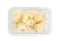 Frozen cauliflower florets in plastic container isolated, top view. Vegetable preservation