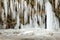 Frozen cave with big sharp icicles