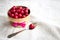 Frozen cherries in a wooden bowl