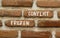 Frozen conflict symbol. Concept words Frozen conflict on beautiful red brown brick wall on beautiful red brown brick wall