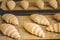 Frozen croissants on cooking paper