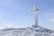 Frozen cross in Parang Mountains, Romania.