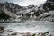 Frozen Czarny Staw Gasienicowy lake in winter in Tatra Mountains close to Zacopane, Poland