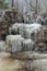 Frozen Dauda waterfall in winter. Close up fragment