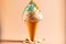 Frozen dessert most delicious ice cream cone on peach background