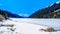 Frozen Duffey Lake wit the snow capped peaks in British Colum