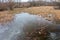 Frozen floodplain from drone perspective in winter.