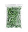 Frozen green beans in plastic bag isolated on white. Vegetable preservation