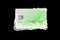 Frozen green credit card in white ice blocks