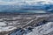 Frozen highway, mountain and lake