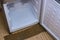 Frozen ice on the inside of the refrigerator chamber with the