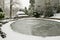 Frozen Ice on a Park Boating Pond.