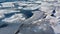 Frozen ice shoreline over the sea. Ice formations at the coast S