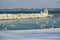 Frozen jetty and lighthouse at Versoix, Geneva,