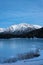 The frozen lake Lautersee near Mittenwald with snowy mountains