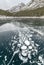 Frozen Lake Minnewanka with Methane Bubbles