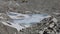 Frozen lake on the Ngozumba Glacier