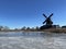 Frozen lake with the windmill from IJlst
