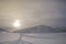 Frozen landscape in the Norwegian Arctic sunset