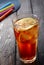 Frozen lemon tea on wooden table