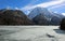 Frozen little alpine lake called Lago del Predil in Italian Lang