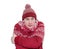 Frozen man in red sweater, scarf and hat warming hands, isolated on white background. File contains a path to isolation.