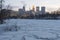 Frozen mississippi river and minneapolis skyline