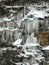 The frozen mountainside and forest filled with icicles near a river in West Virginia - WINTER - USA