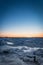 Frozen ocean at sunset - Baltic sea sunset at beach in Tallinn, Estonia