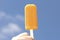 Frozen orange Popsicle