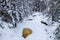 Frozen over Amnicon River and waterfalls with fresh snow during winter at Amnicon Falls State Park in Wisconsin